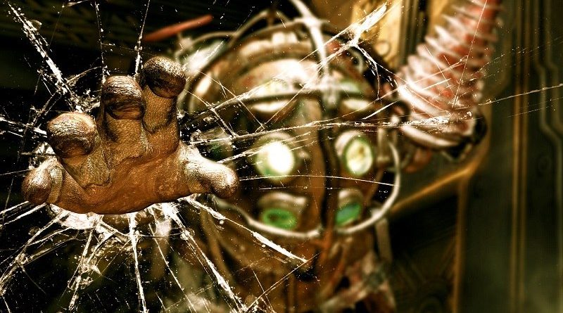 Imagem de um Big Daddy do jogo BioShock quebrando um vidro com a mão. A cena é intensa, destacando a força e presença ameaçadora do personagem.