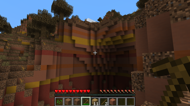 Captura de tela do bioma de badlands em Minecraft, mostrando várias camadas de Terracota colorida.